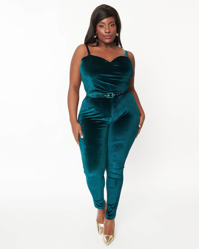 Front of a model wearing a size 5X Unique Vintage Teal Velvet Jumpsuit in Teal by Unique Vintage. | dia_product_style_image_id:332852